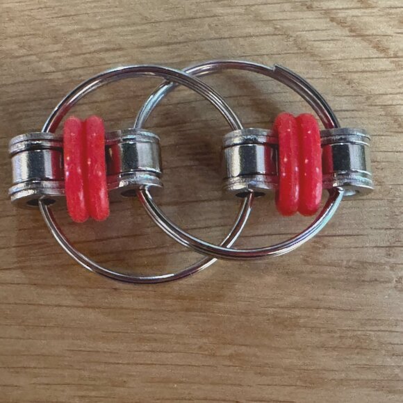 Fidget Toy: 4 Piece Flippy Roller Flick (Bike) Chain Fidget Toys with Case - Picture 11 of 16